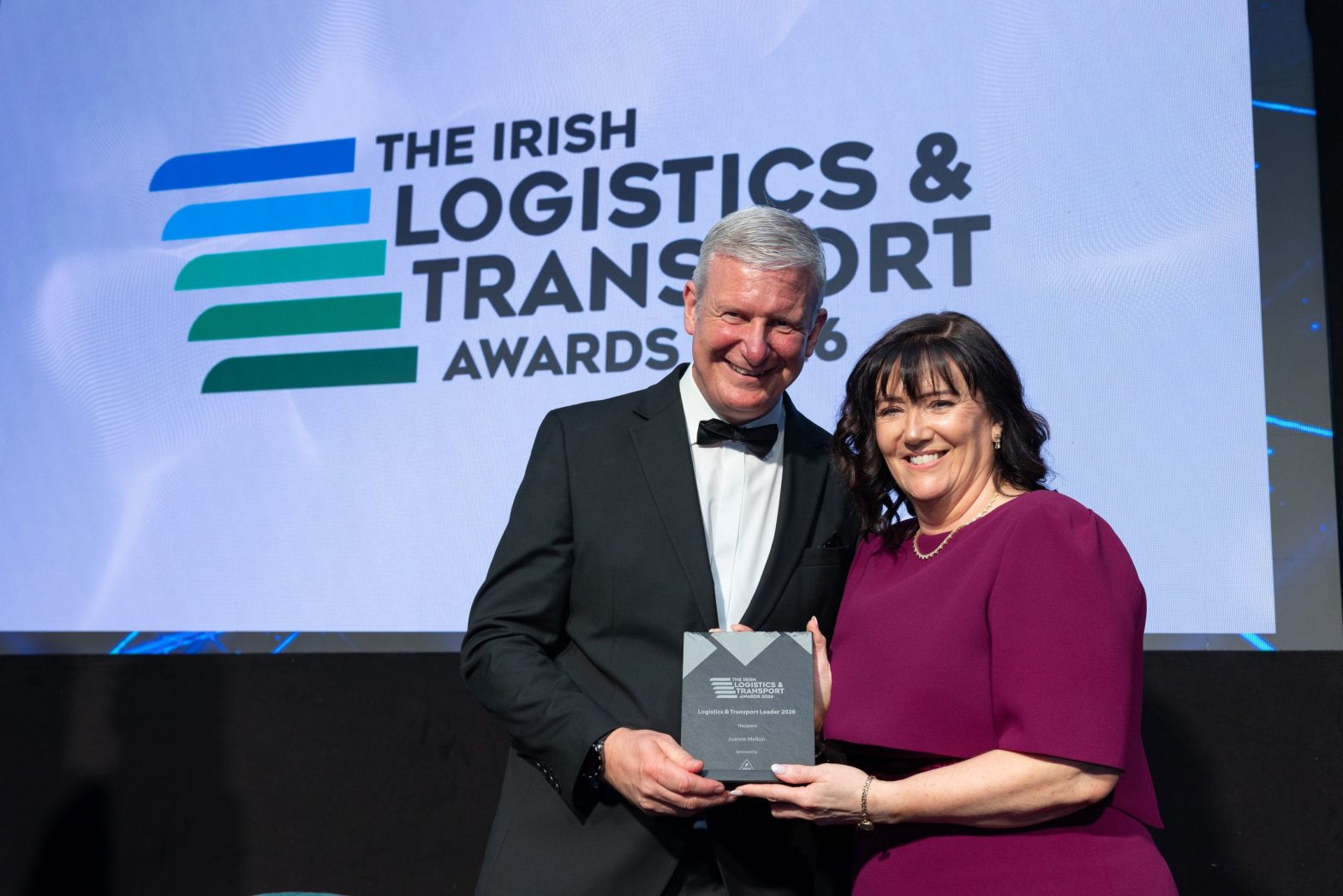 BWG Foods’ Logistics Director, Joanne Mellon, receiving the Logistics & Transport Leader Award 2026 from Lee Hazzard, Recruitment Manager for ISM Recruitment at the Irish Logistics & Transport Awards, where BWG Foods also received recognition including the Green Impact Award, Green Supply Chain Excellence and Sustainable Team of the Year.