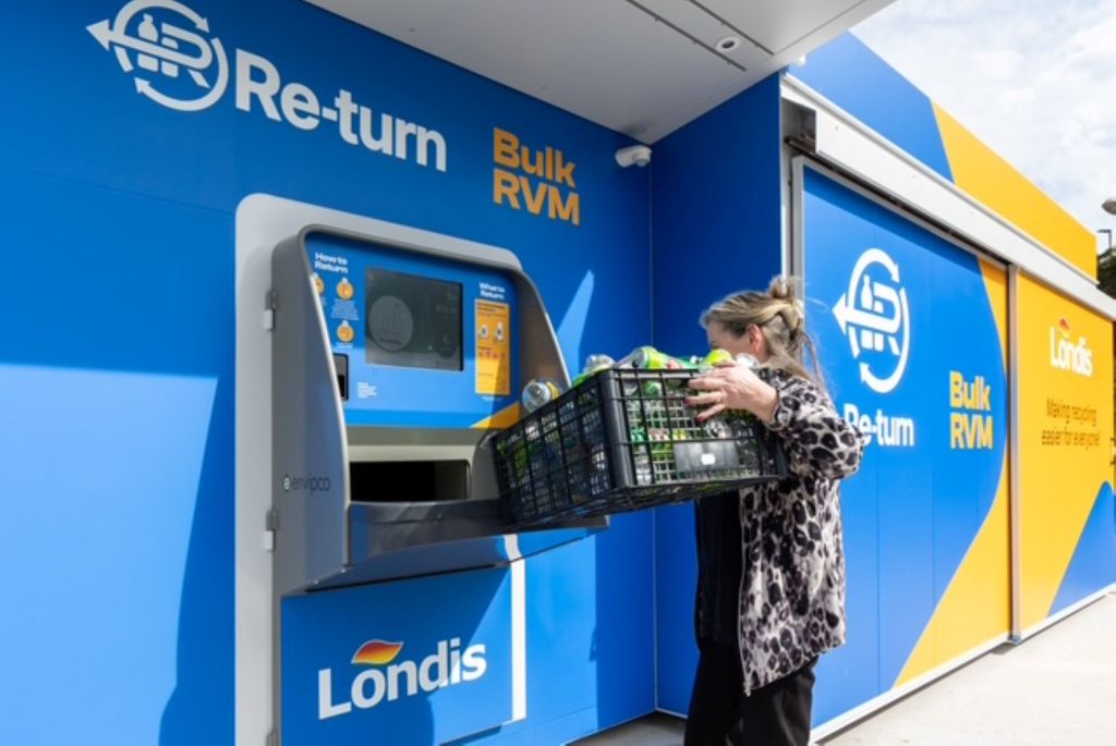Londis customer Margaret Kehoe using the new Bulk Reverse Vending Machine Installed at Londis The Faythe